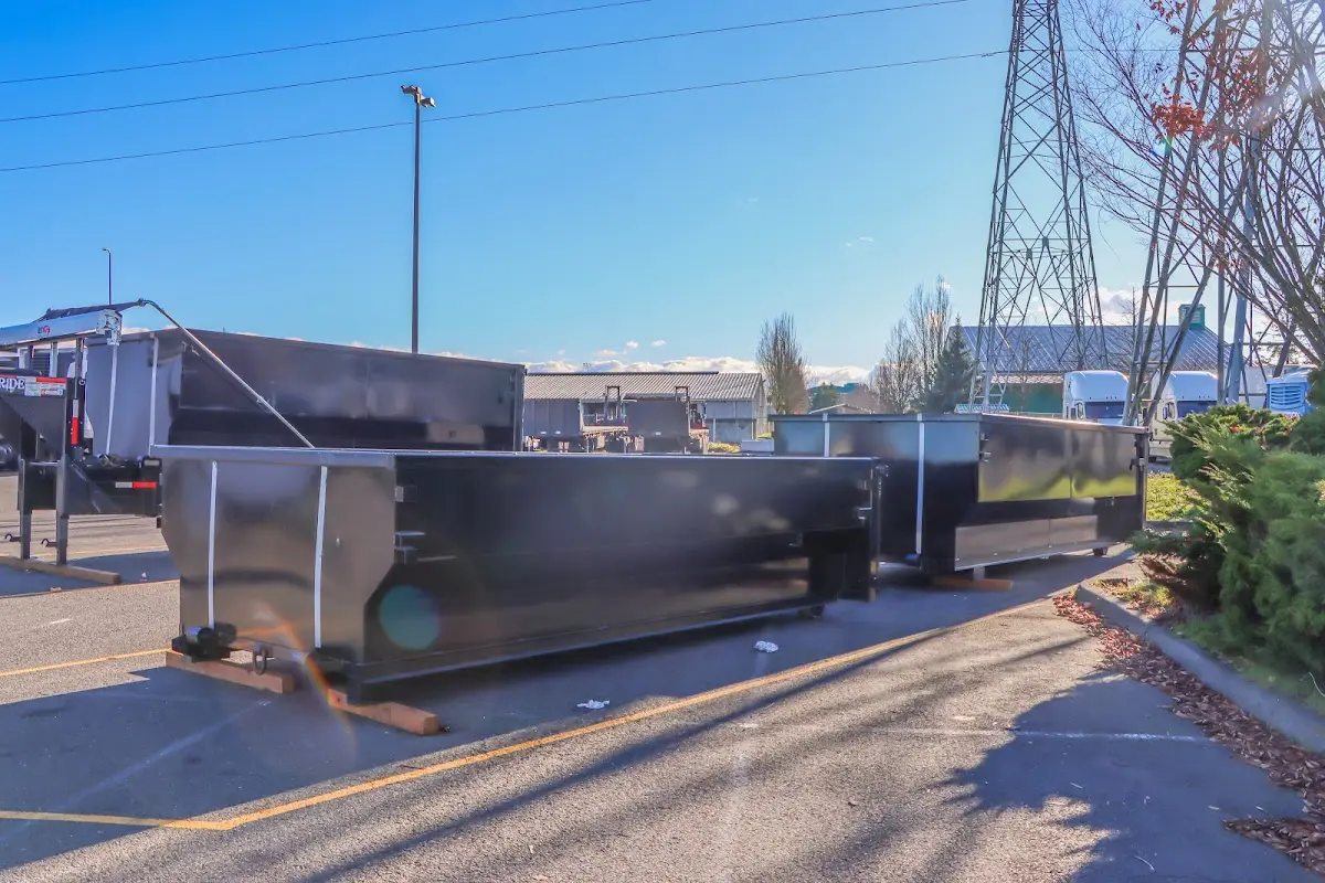 Roll-off dumpster ready for waste disposal at job site for 6 Yard Dumpster Rental in Pell City